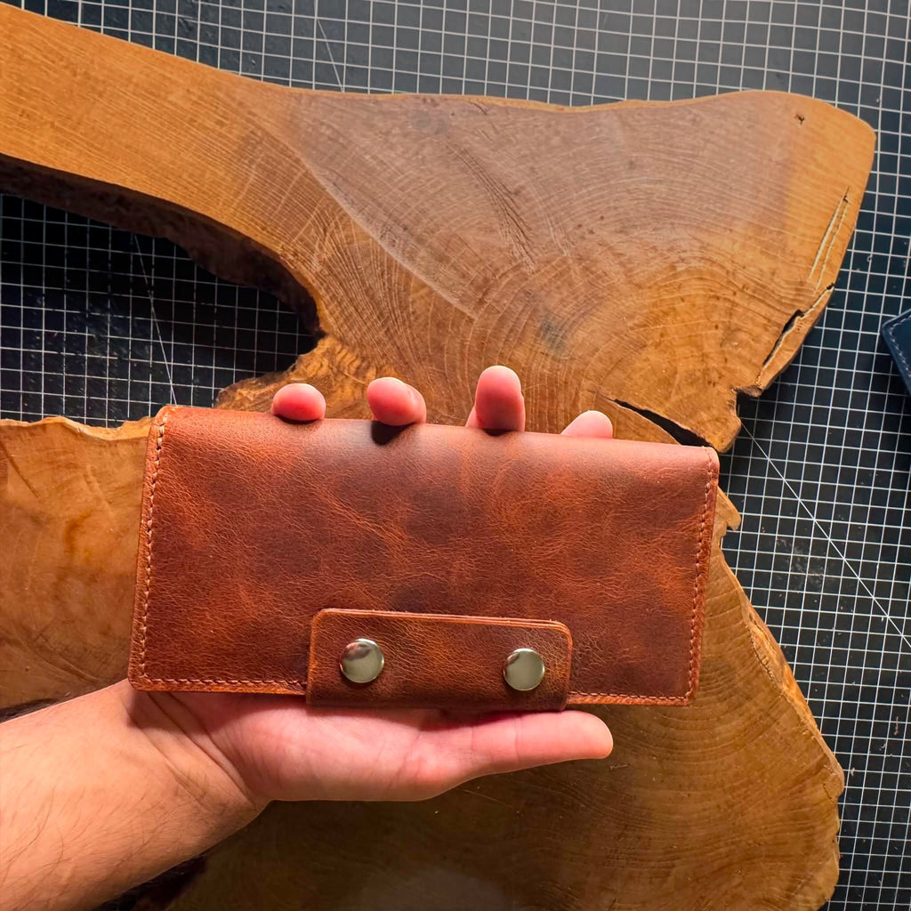 Portefeuille long femme en cuir avec une fermeture éclair